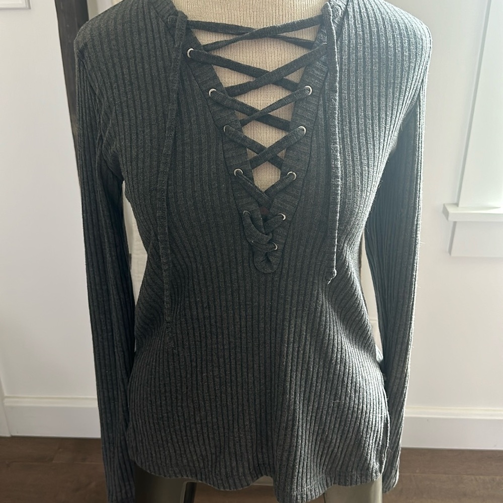 Poof long sleeve lace up front top